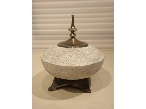 White Display With Gold Base